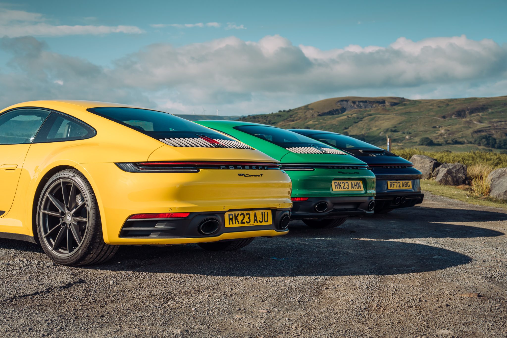 Image1 Speed Yellow Porsche 911 Carrera T, Python Green Porsche 911 GTS and Gentian Blue Porsche 911 GT3